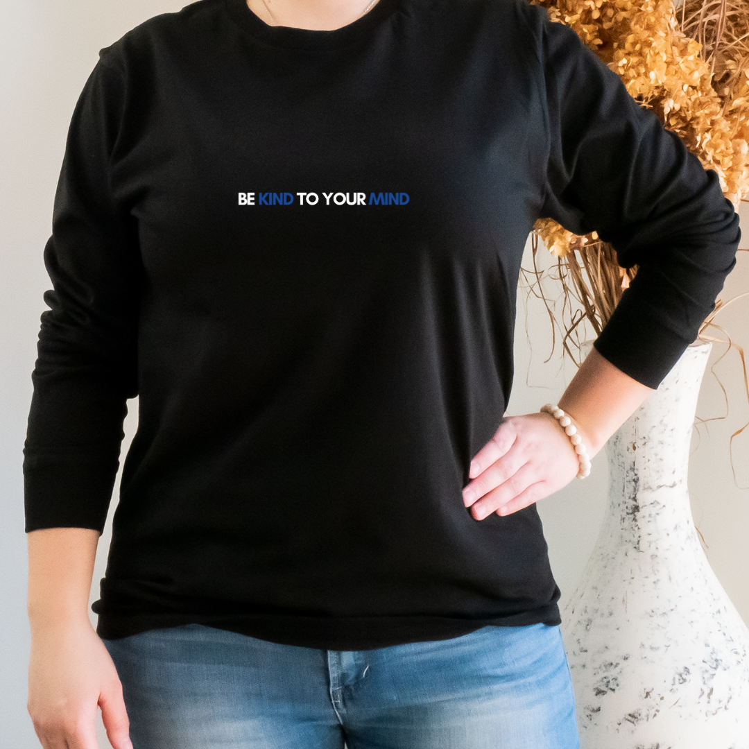 “Wearing this shirt can serve as a constant reminder to stay in tune with our mental health, practice self-care, and be kind to both ourselves and others. Join us in promoting good mental health practices with our "Be Kind to Your Mind" shirt.”