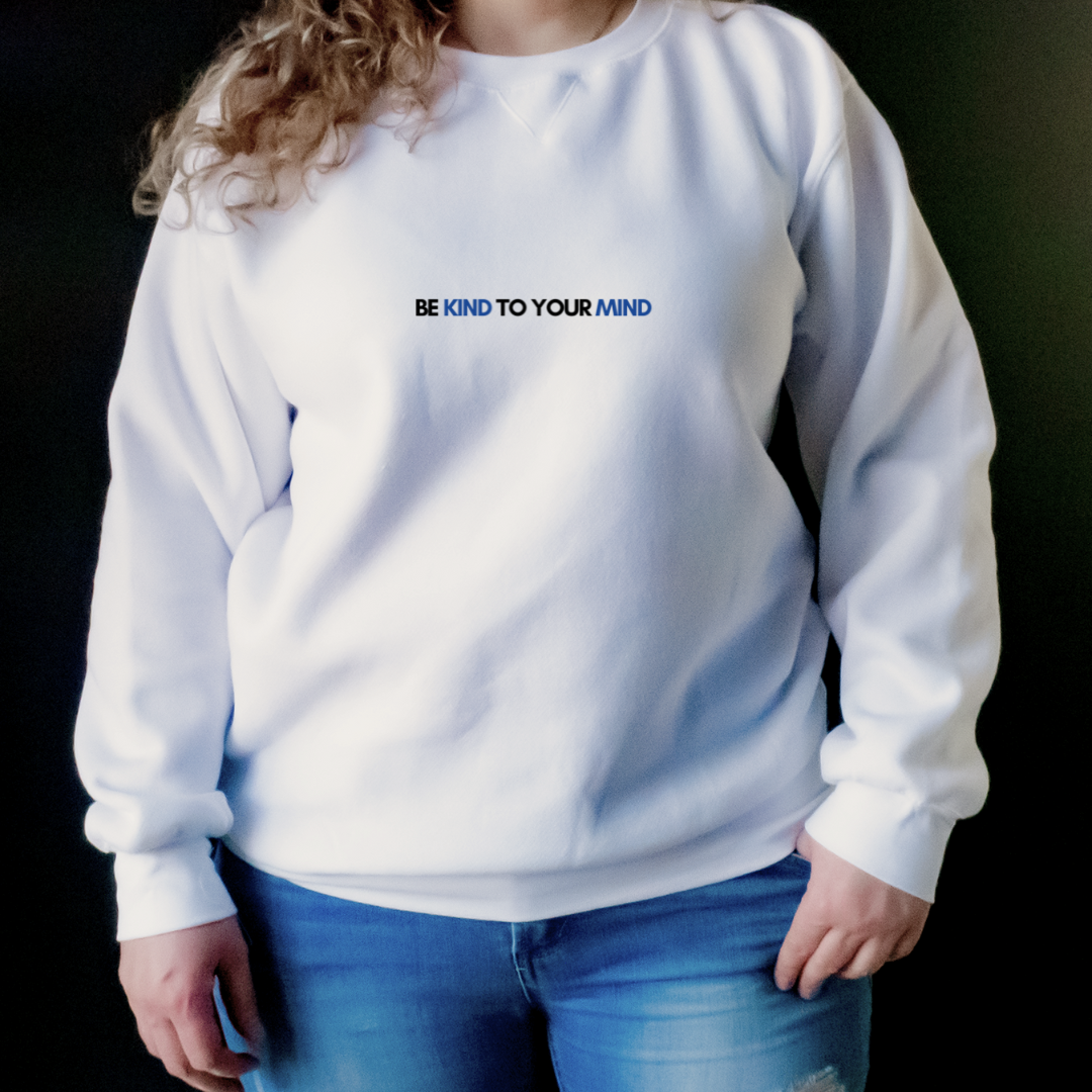 “Wearing this shirt can serve as a constant reminder to stay in tune with our mental health, practice self-care, and be kind to both ourselves and others. Join us in promoting good mental health practices with our "Be Kind to Your Mind" sweater.”