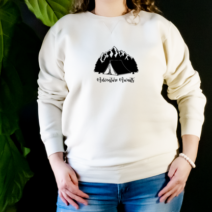 "The Sweater features a design of a camping scene; a cozy tent sits in the middle of a forest, surrounded by trees and a mountain range in the distance. We want to capture the adventurous spirit and love for the great outdoors that camping lovers feel".