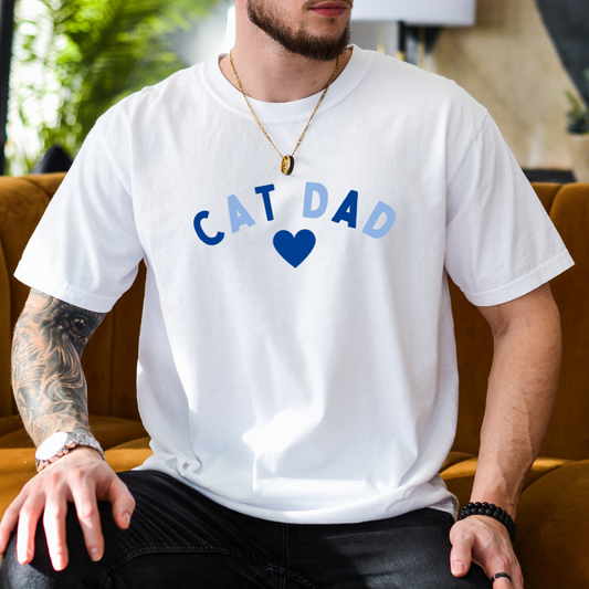 "Cat Dad Heart design centered on white t-shirt."