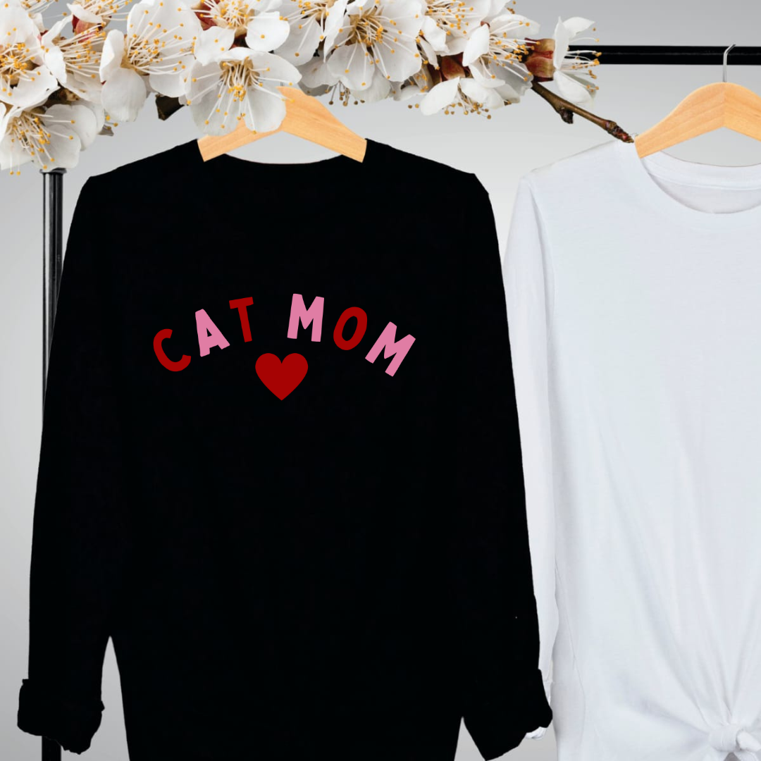 "Cat Mom Heart design centered on black long sleeve shirt." 