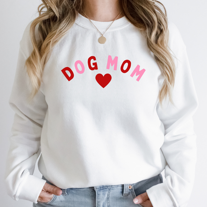 "Dog Mom Heart design centered on white sweater."