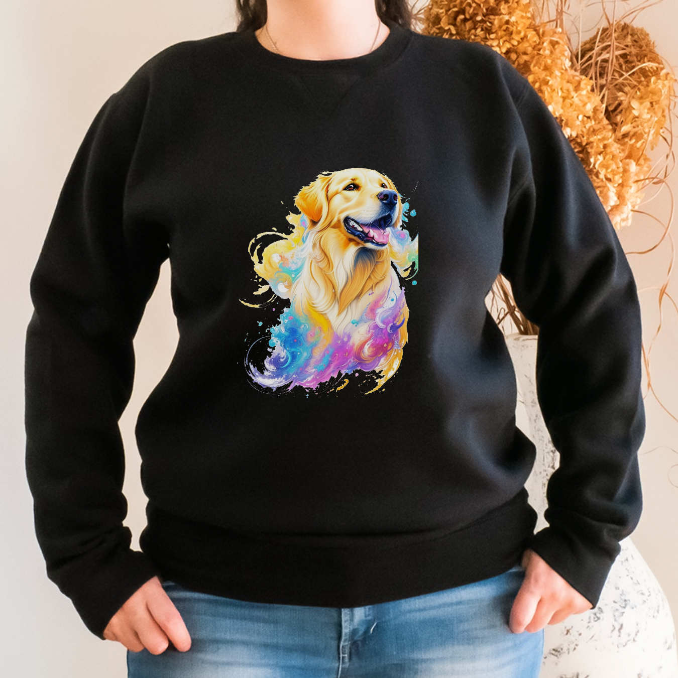 "Golden lab graphic design centered on black sweater."
