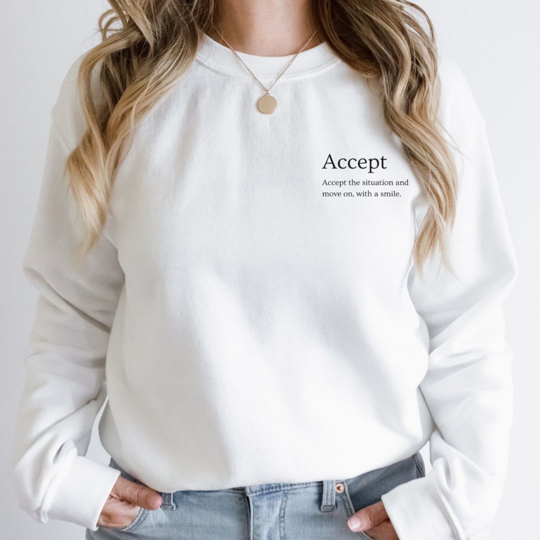 “Words to wear: inspirational quotes on a white sweater”