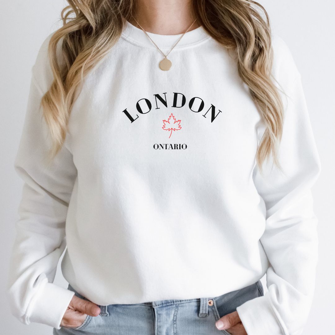"London Ontario graphic design centered on white sweater."