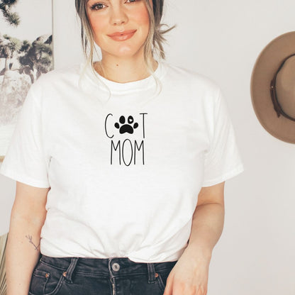 "Cat mom text design centered on white t-shirt."