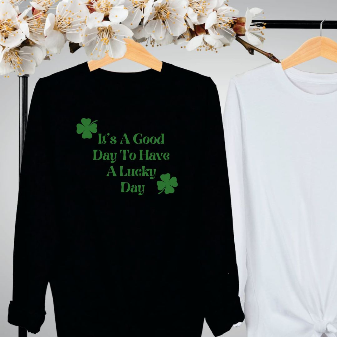 "Lucky Day text design centered on black long sleeve shirt."